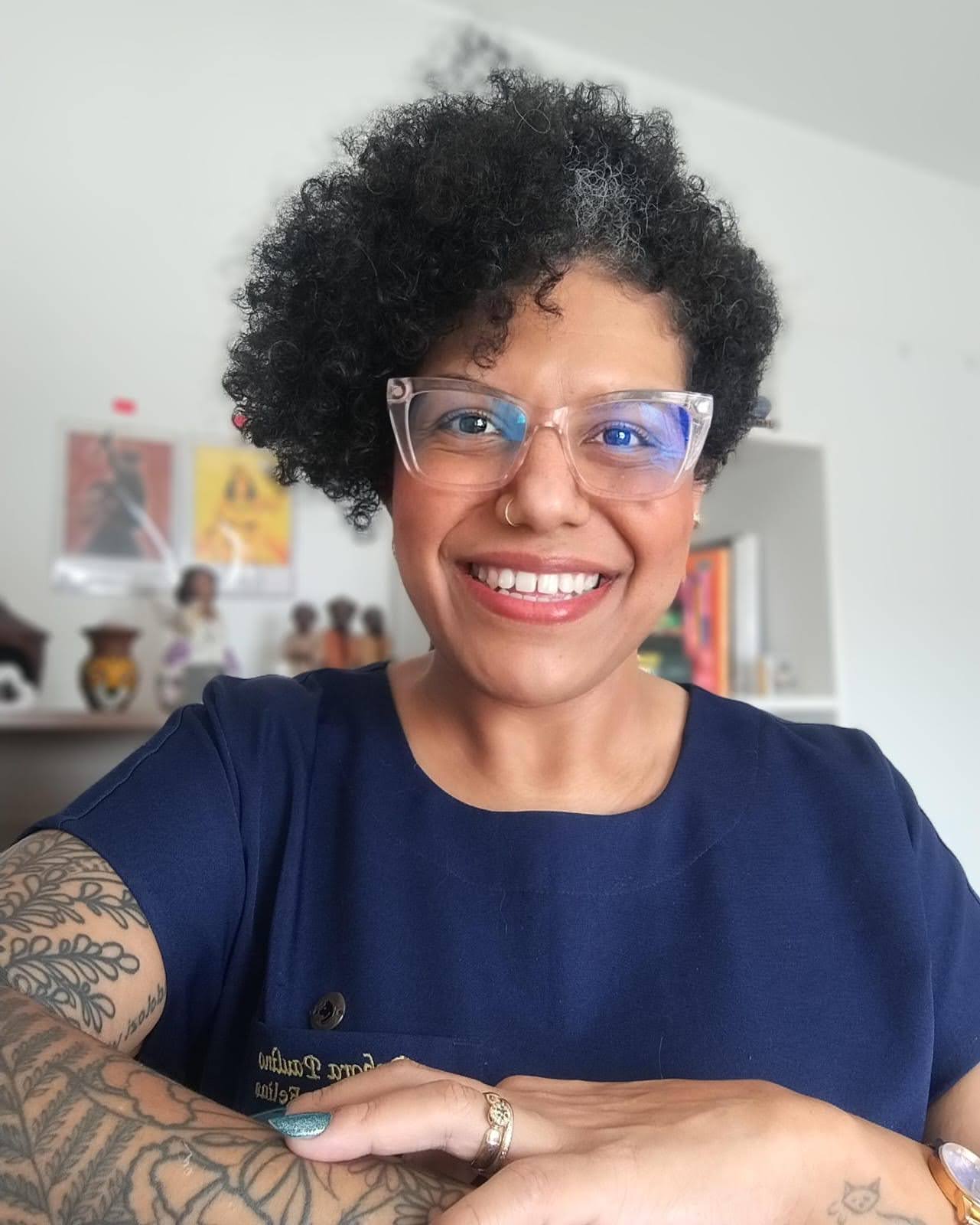Debee Paulino smiling in her professional office